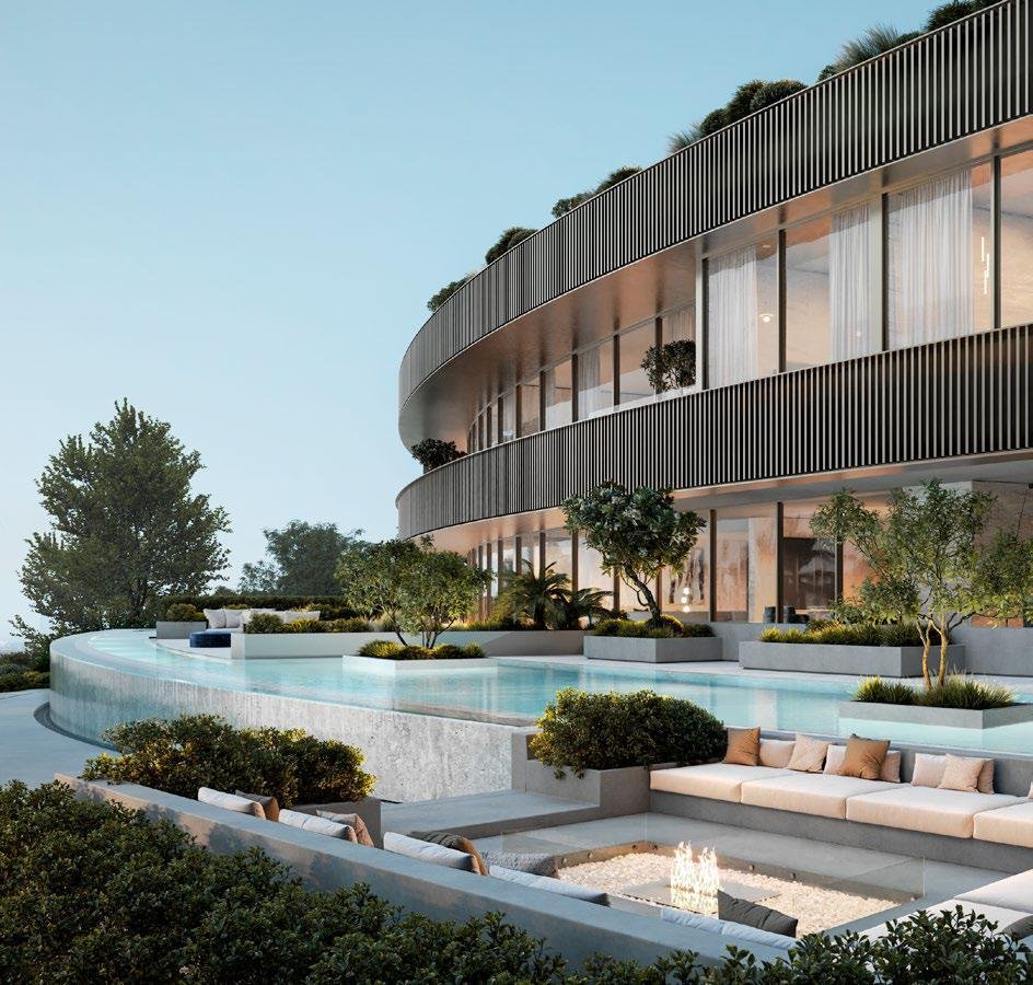 Beachfront evening scene at Bashayer Mansions: direct waterfront units with sunset views over Arabian Gulf at Hudayriyat Island